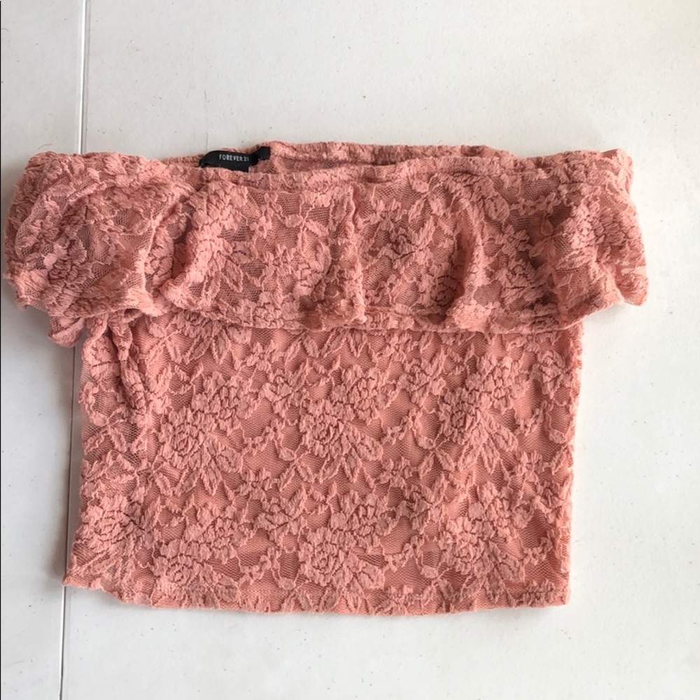 A pink foral off the shoulder shirt